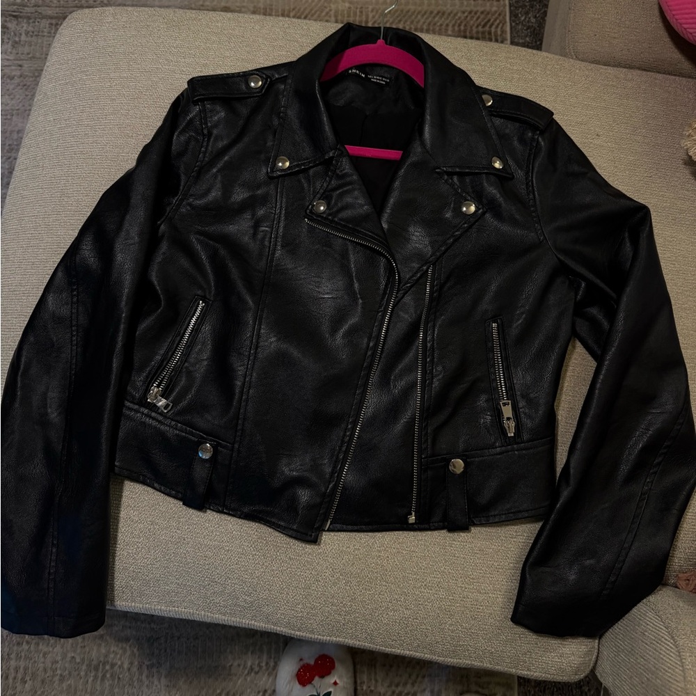 Chic Black leather Jacket with Silver Accents